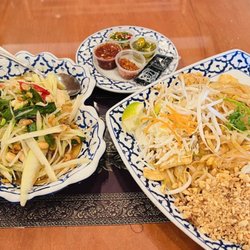 Lucky Elephant Thai Cuisine - 1. Pad Thai chicken 2. Papaya Salad Condiments