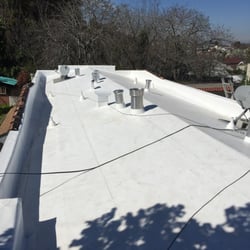 Acker Roofing - This was a tar & gravel roof we removed and replaced with a state of the art Thermo Polyolefin membrane or "TPO".