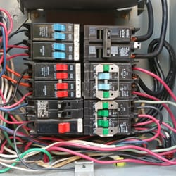 Simpson Electric - A 100 amp main service panel that was causing flickering lights in the home.
