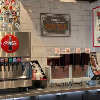 Raising Cane's Chicken Fingers - Beverage and utensil station - Chicken Shop Near Me - Edison, New Jersey Raising Cane's Chicken Fingers - Beverage and utensil station - Chicken Shop Near Me - Edison, New Jersey