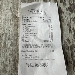 Two margaritas, tiny ass cheese dip, fajitas, and a burrito.