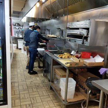 China Express - two workers in a commercial kitchen - Chinese Near Me - Trenton, New Jersey