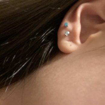 Laughing Buddha Seattle - Double lobe piercing - Tattoo Near Me - Seattle, Washington Laughing Buddha Seattle - Double lobe piercing - Tattoo Near Me - Seattle, Washington