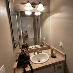 JBH Maintenance and Remodeling - Before of bathroom vanity remodel