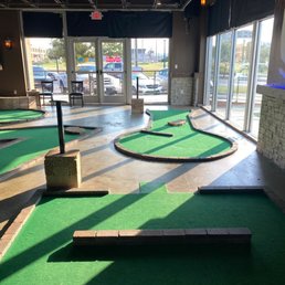 a miniature golf course in a building