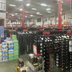 Lee's Discount Liquor - Wine area looking back to pallets and pallets of beer
