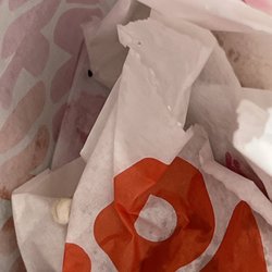 Dunkin' - Dark gunky stuff inside bag and a piece of what looks like an egg white. Didn't order that.