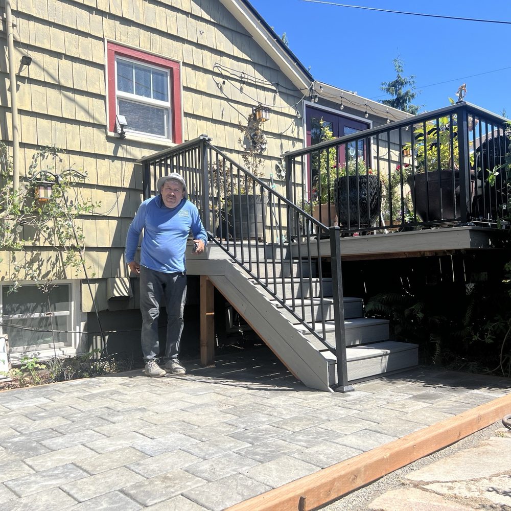Cleo Landscaping - Cleo and the new deck resurfacing, railing, stairs and patio he completed for us. - Landscaping Near Me