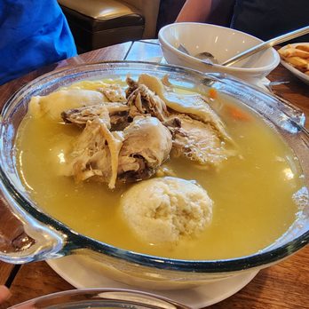 Manhattan in the Desert - The humongous chicken in a pot with chicken broth, noodles, rice, kreplach, matzo ball, and 1/2 of a chicken. - Delis Near Me - Palm Springs, California