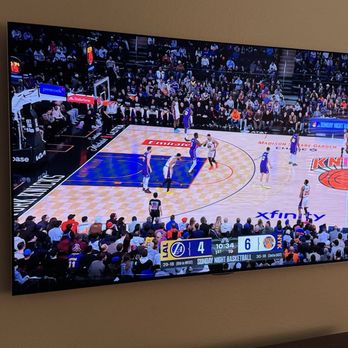 Pro TV Mount - Mounted 65" TV - Home Theatre Installation Near Me Pro TV Mount - Mounted 65" TV - Home Theatre Installation Near Me