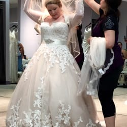Treasures Formals and Bridal - Lauren getting me all "jacked up" with added sleeves, belt, and veil!