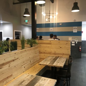 lcey Poki - Behind this wall is the cashier where you first go to pay. Then you take your ticket to enter the line for either poke or ice cream. - Poke Near Me - San Jose, California lcey Poki - Behind this wall is the cashier where you first go to pay. Then you take your ticket to enter the line for either poke or ice cream. - Poke Near Me - San Jose, California