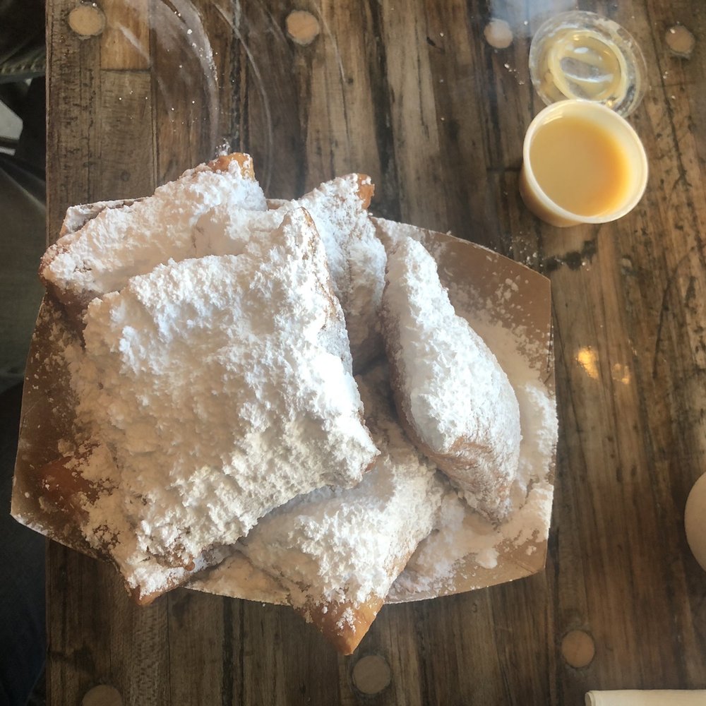 Mo'Bay Beignet - Pillowy beignets with butter cream sauce and coffee. - Coffee & Tea Near Me - Mobile, Alabama Mo'Bay Beignet - Pillowy beignets with butter cream sauce and coffee. - Coffee & Tea Near Me - Mobile, Alabama