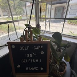 Valencie Exceus - Inspirational signage inside the office in Fort Lauderdale