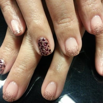 Salon Yoo - Nude nails with gold glitter fade and cheetah print accents. Gel polish mani. - Hair Salons Near Me - Rancho Cucamonga, California Salon Yoo - Nude nails with gold glitter fade and cheetah print accents. Gel polish mani. - Hair Salons Near Me - Rancho Cucamonga, California