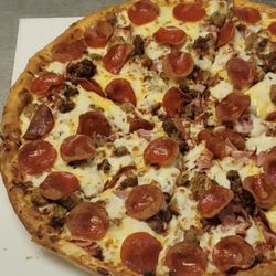 Big Chuck's Pizza Plus - Ham, Bacon, Sausage, Ground Beef and Pepperoni.