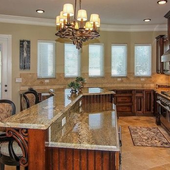 Nickelson Construction - a kitchen with granite countertops - General Contractors Near Me