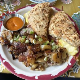Egg Sandwich with Bacon, breakfast potatoes Egg Sandwich with Bacon, breakfast potatoes