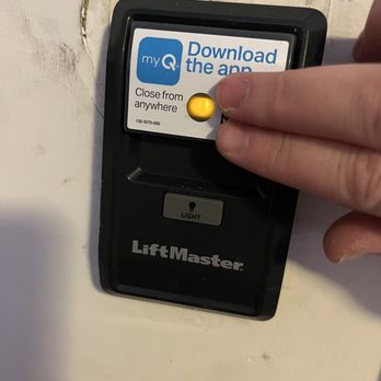 All Access Garage Door - Don't worry that crushed part on the wall was already there! Wall remote & you can use MyQ to open & close from your smartphone! 10/06/2023 - Garage Door Services Near Me - Las Vegas, Nevada
