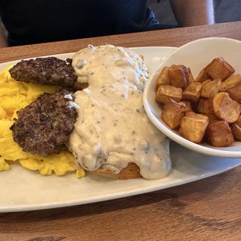 Another Broken Egg Cafe - Scrambled eggs, sausage, sausage gravy on biscuits, country potatoes - Breakfast & Brunch Near Me - Clermont, Florida