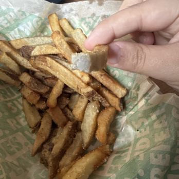 Wingstop - A french fry that looks grey inside it and it looks not edible - Chicken Wings Near Me - Thornhill, Ontario