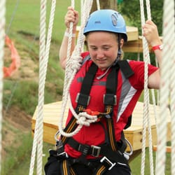 Lost Valley Retreat Center - Conquering the train tracks on the high ropes course