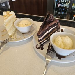 Coconut cake and chocolate cashew cake. Both were AMAZING Coconut cake and chocolate cashew cake. Both were AMAZING