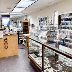 The Crystal Garden - Front showroom filled with jewelry, aromatherapy, and gemstones.