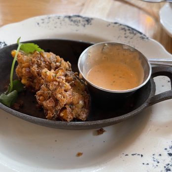 Whistle Britches - Plano - Corn fritters! We had already eaten over half before we remembered to take a picture. - American Near Me - Plano, Texas Whistle Britches - Plano - Corn fritters! We had already eaten over half before we remembered to take a picture. - American Near Me - Plano, Texas
