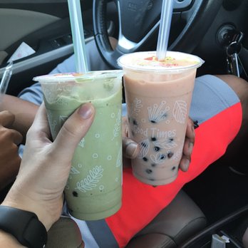 New Tapioca Master - Half sweet matcha green tea smoothie with tap and half sweet strawberry pineapple smoothie with tap. - Coffee & Tea Near Me - Houston, Texas