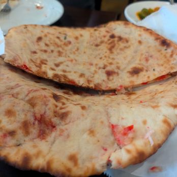 Saffron Indian Cuisine - Peshwari naan - Indian Near Me - Greenville, South Carolina Saffron Indian Cuisine - Peshwari naan - Indian Near Me - Greenville, South Carolina