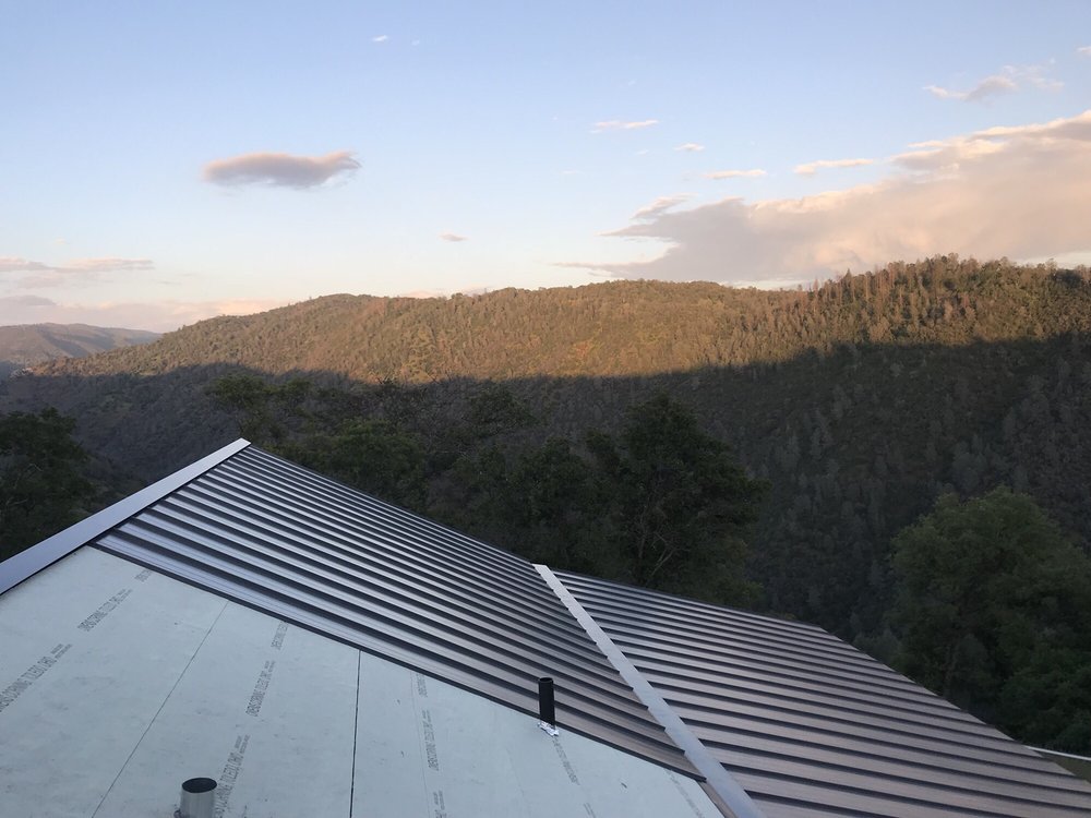 Slide of JMK Roofing