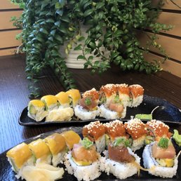 Mango roll, tuna poke roll, candied salmon roll Mango roll, tuna poke roll, candied salmon roll