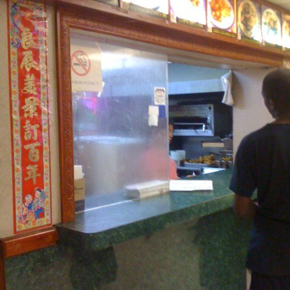 Peking Gardens - a man standing at the counter of a restaurant - Chinese Near Me - Bridgeport, Connecticut Peking Gardens - a man standing at the counter of a restaurant - Chinese Near Me - Bridgeport, Connecticut