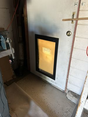 Dog door installation - Big door for a big dog. 410 Handyman got this taken care of.