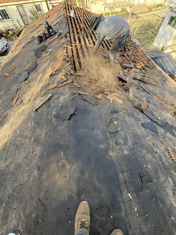 Slide of ARG Roofing Services