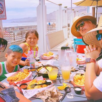 Wooly's - Family time by the ocean view patio seating area - Seafood Near Me - Pismo Beach, California Wooly's - Family time by the ocean view patio seating area - Seafood Near Me - Pismo Beach, California