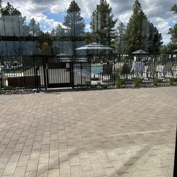 Pool and jacuzzi with beautiful setup corn hole off to the side Pool and jacuzzi with beautiful setup corn hole off to the side