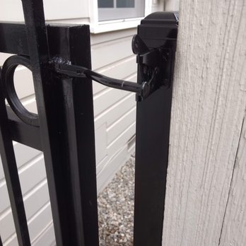 Western Fence Co. - Close up of finished post with fresh black paint. - Fences & Gates Near Me - Altadena, California Western Fence Co. - Close up of finished post with fresh black paint. - Fences & Gates Near Me - Altadena, California