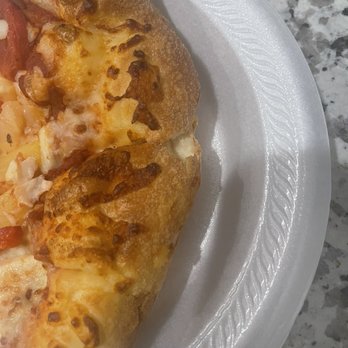 Domino's Pizza - a slice of pizza on a paper plate - Pizza Near Me - Chalemette, Louisiana Domino's Pizza - a slice of pizza on a paper plate - Pizza Near Me - Chalemette, Louisiana
