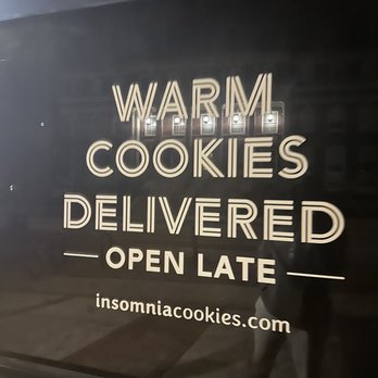 Insomnia Cookies - a sign in the window of a bakery - Desserts Near Me - Greensboro, North Carolina Insomnia Cookies - a sign in the window of a bakery - Desserts Near Me - Greensboro, North Carolina