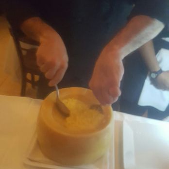Osteria Rustica - Risotto in a cheese wheel. Brilliant - Italian Near Me - Bunnell, Florida Osteria Rustica - Risotto in a cheese wheel. Brilliant - Italian Near Me - Bunnell, Florida