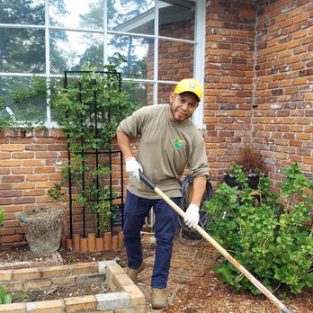 Amazing Lawn Care - a man with a shovel in his hand - Lawn Services Near Me Amazing Lawn Care - a man with a shovel in his hand - Lawn Services Near Me