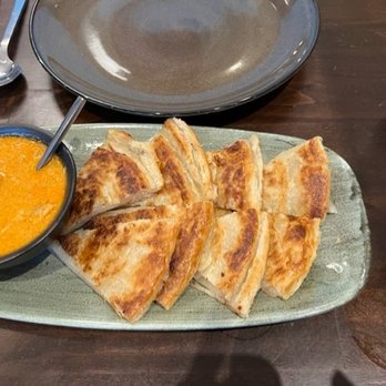 Burma 2 - Palata bread appetizer with chicken curry dip. - Burmese Near Me - Walnut Creek, California Burma 2 - Palata bread appetizer with chicken curry dip. - Burmese Near Me - Walnut Creek, California