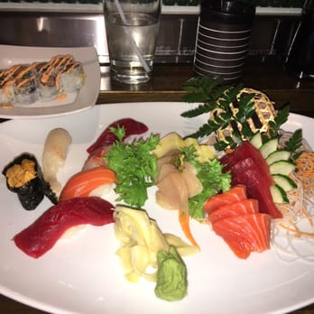 Bambu Modern Asian - Sushi sashimi combo with a spicy yellow tail jalapeño roll - Asian Fusion Near Me - Danbury, Connecticut Bambu Modern Asian - Sushi sashimi combo with a spicy yellow tail jalapeño roll - Asian Fusion Near Me - Danbury, Connecticut