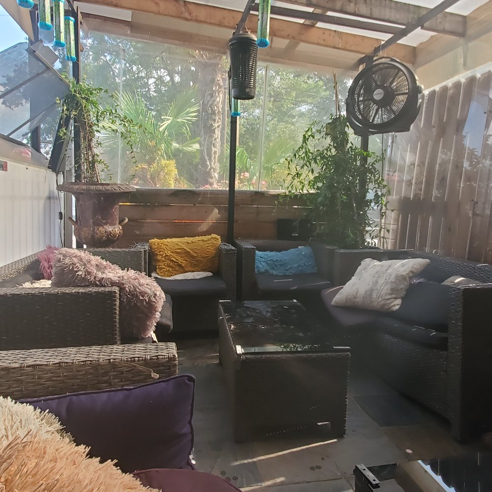 Addis X Hookah Lounge - Empty lounge area. Seems like a  cool spot at night. Furniture kinda worn in... - Hookah Bars Near Me - Chamblee, Georgia