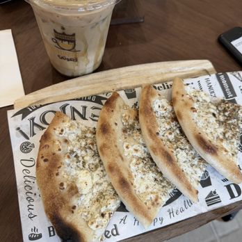 Qahwtea - White cheese and zahtar flatbread - Bakeries Near Me - Huntsville, Alabama