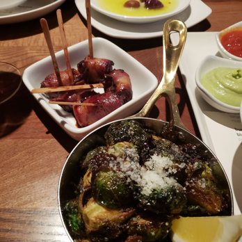 Cucina Paradiso - Bacon-wrapped dates ($8, top) and flash fried brussel sprouts ($8, bottom) are great choices for appetizers - Italian Near Me - Oak Park, Illinois Cucina Paradiso - Bacon-wrapped dates ($8, top) and flash fried brussel sprouts ($8, bottom) are great choices for appetizers - Italian Near Me - Oak Park, Illinois