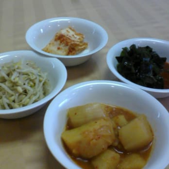 Kimbaek Restaurant - top clockwise: kimchi; seaweed; boiled potatoes; bean sprouts in sesame oil - Korean Near Me - Winnipeg, Manitoba