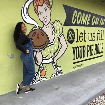 Se7enBites - @alohamelani mural outside - Coffee & Tea Near Me - Orlando, Florida Se7enBites - @alohamelani mural outside - Coffee & Tea Near Me - Orlando, Florida